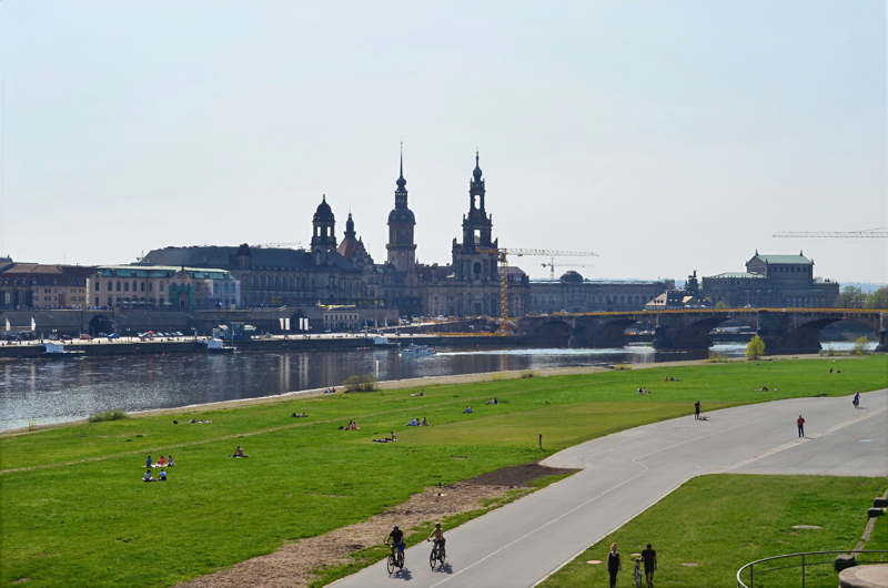 26 - The historic skyline of Dresden, Germany, featuring the prominent towers of the Dresden Castle (Residenzschloss) and the Cathedral of the Holy Trinity (Hofkirche) rising along the River Elbe